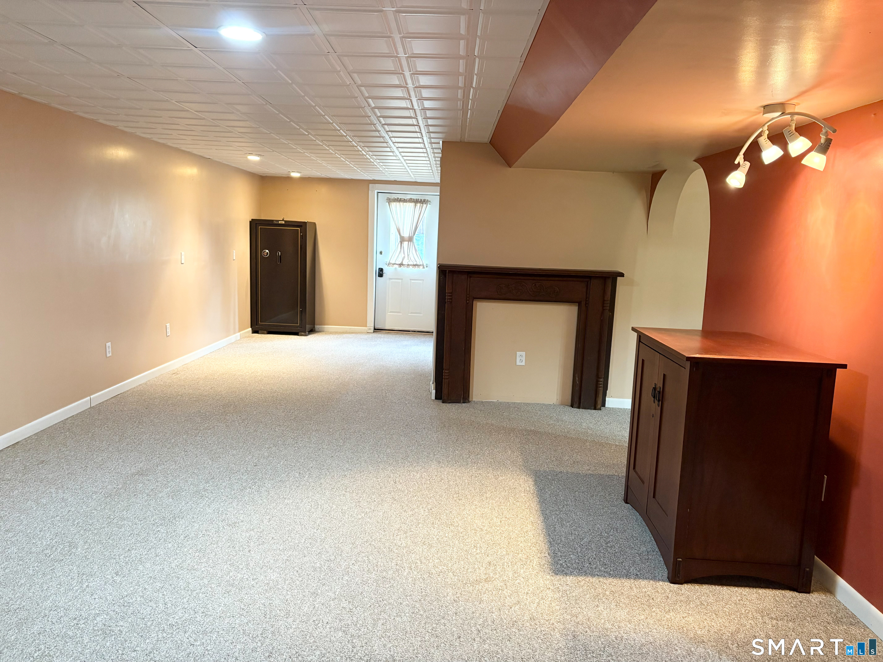 29 Whitney Road Columbia, CT 06237 - Photo 29 of 40 Finished basement second room with walk-out. Potential in-law