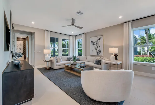 a kitchen with stainless steel appliances granite countertop a refrigerator and a stove