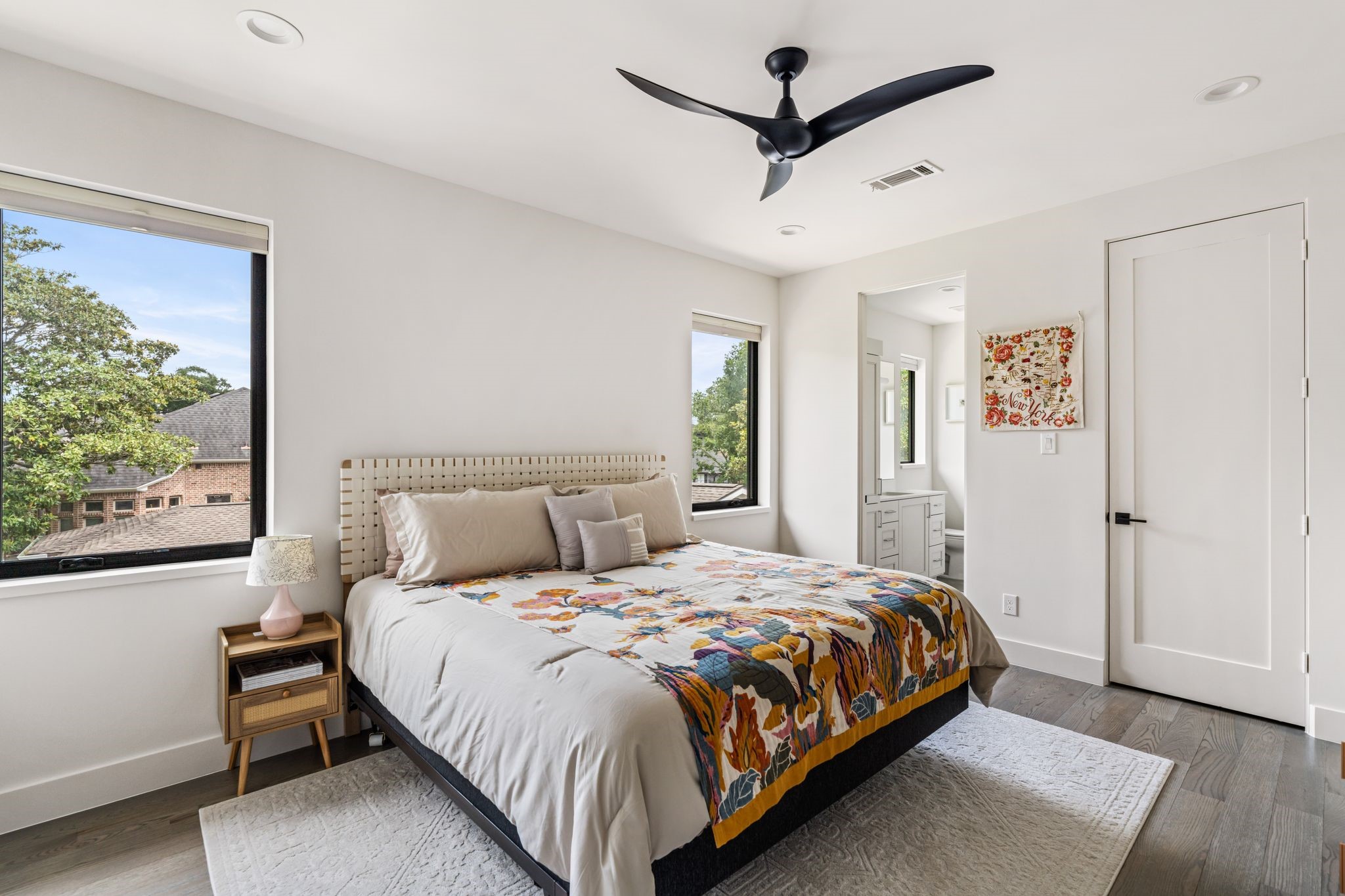 4638 Merwin Street Houston, TX 77027 - Photo 26 of 42 Natural light fills this generously sized secondary bedroom, complete with a private ensuite bath.