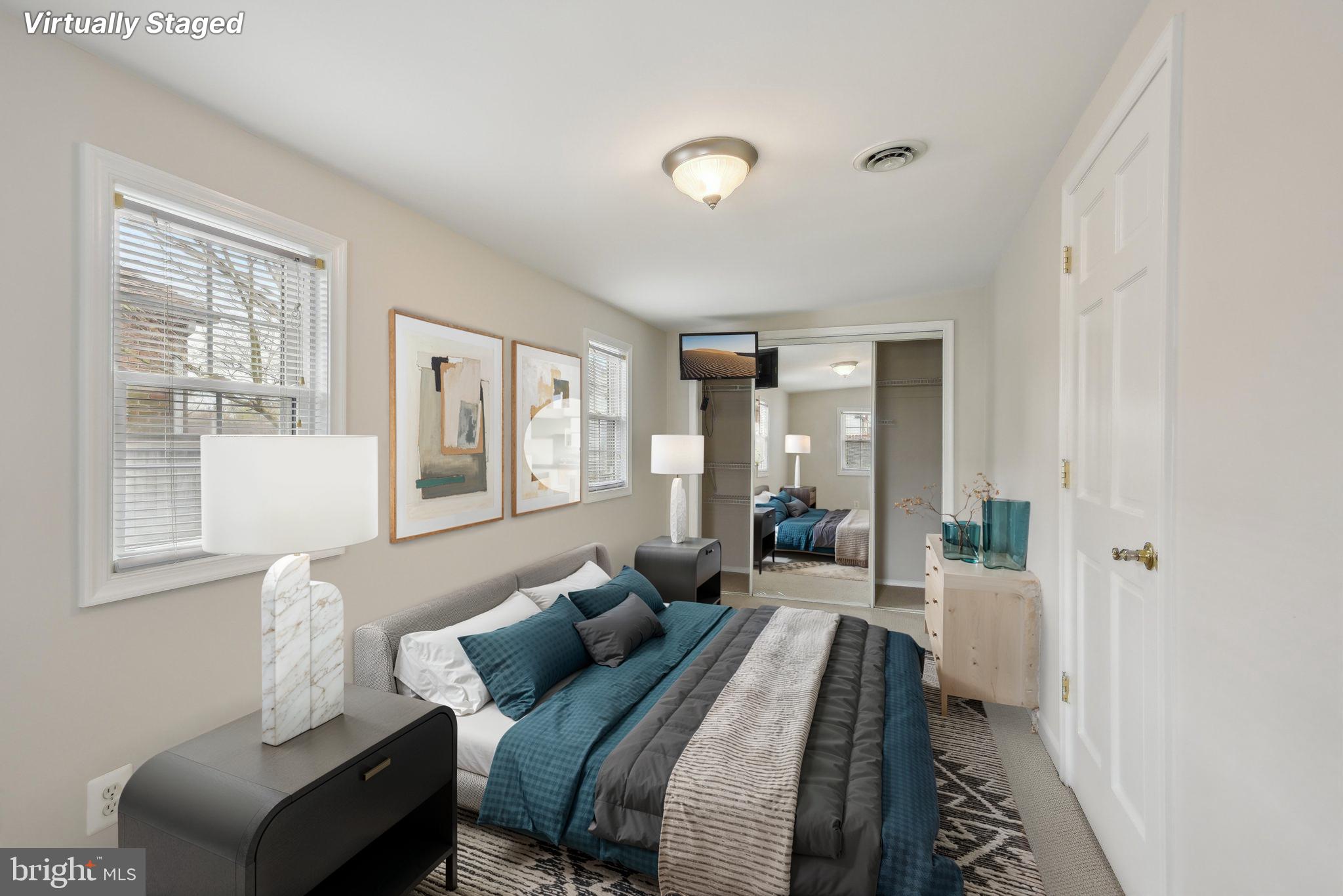 1813 Keymar Road Edgewater, MD 21037 - Photo 21 of 38 a bed room with a bed and a couch