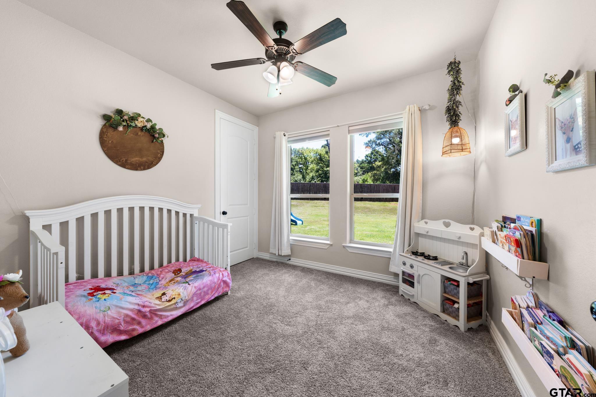 3922 Gable Crest Lane Longview, TX 75605 - Photo 32 of 36 a bedroom with furniture and a window