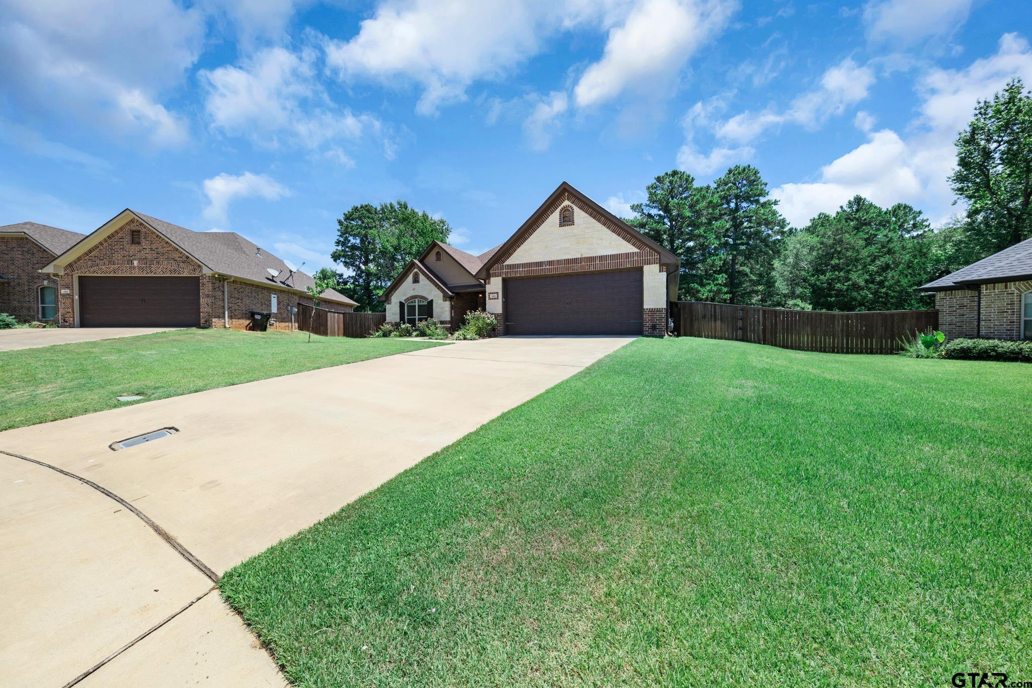3922 Gable Crest Lane Longview, TX 75605 - Photo 4 of 36 a front view of a house with yard