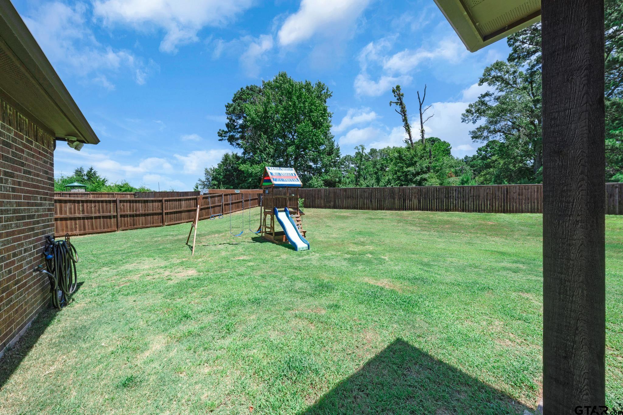 3922 Gable Crest Lane Longview, TX 75605 - Photo 7 of 36 a view of a garden