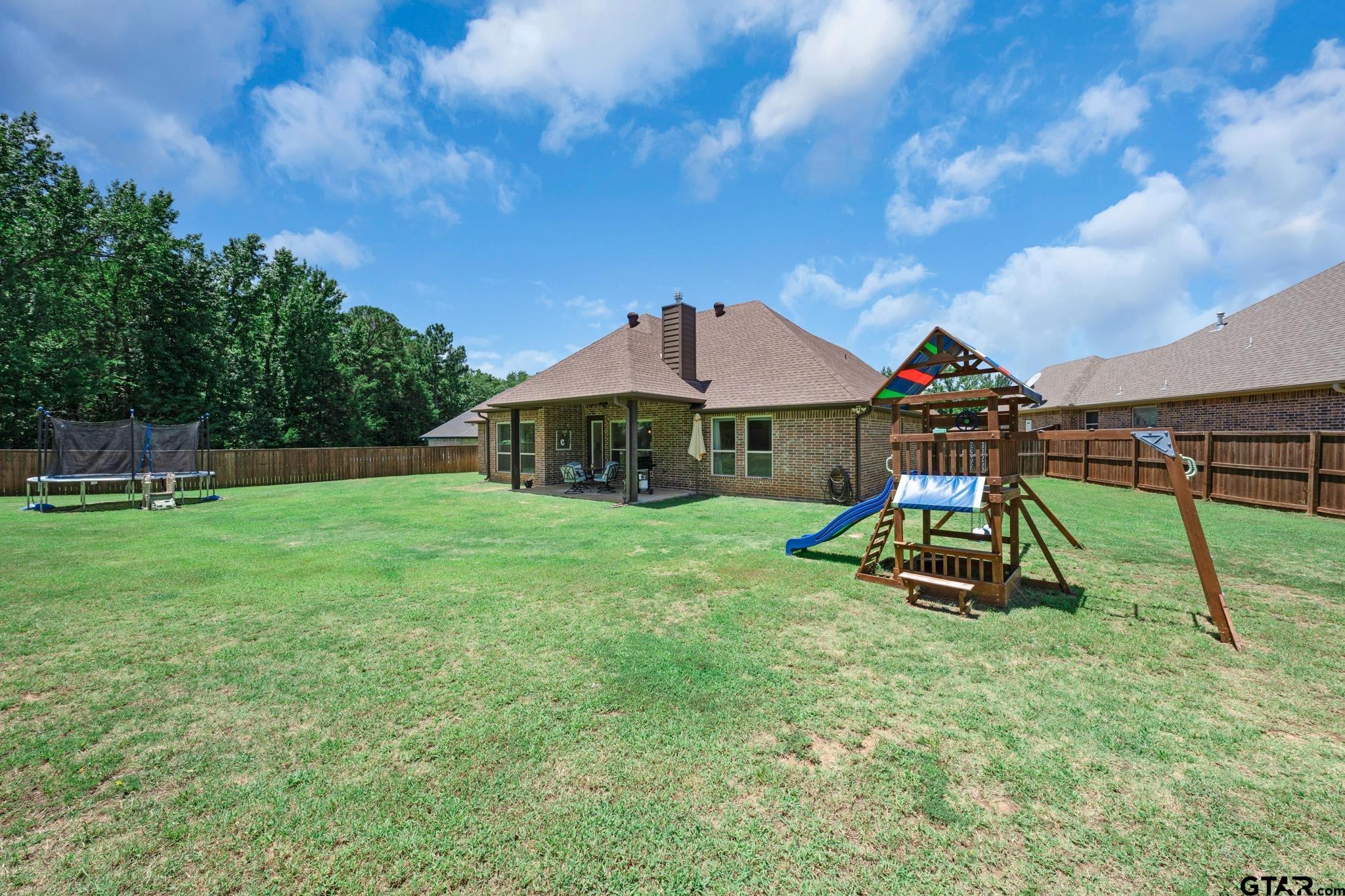 3922 Gable Crest Lane Longview, TX 75605 - Photo 8 of 36 a view of a park with slide