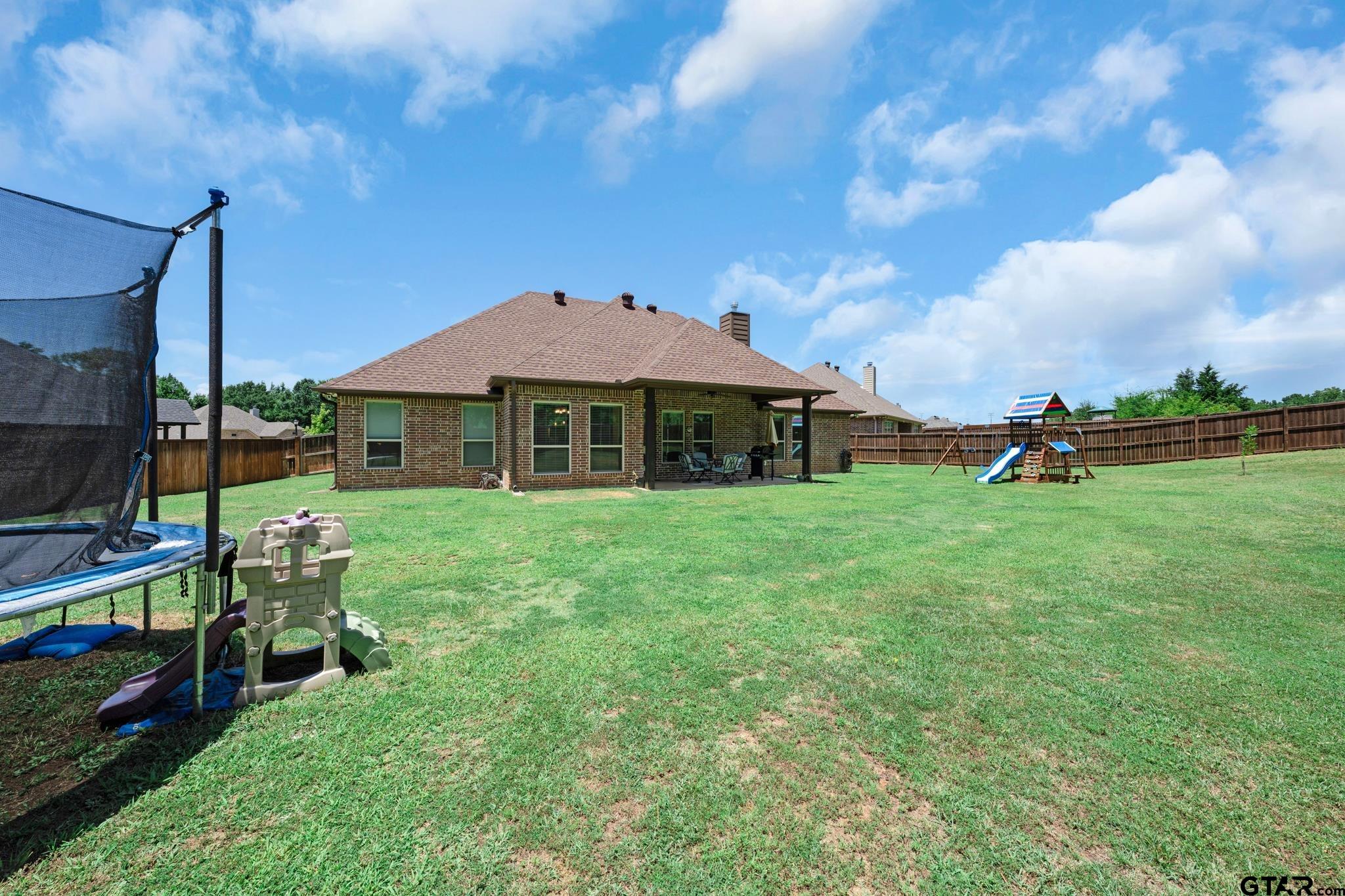 3922 Gable Crest Lane Longview, TX 75605 - Photo 9 of 36 a front view of a house with garden