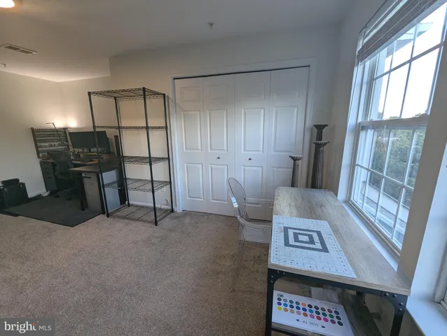 a room with furniture and window