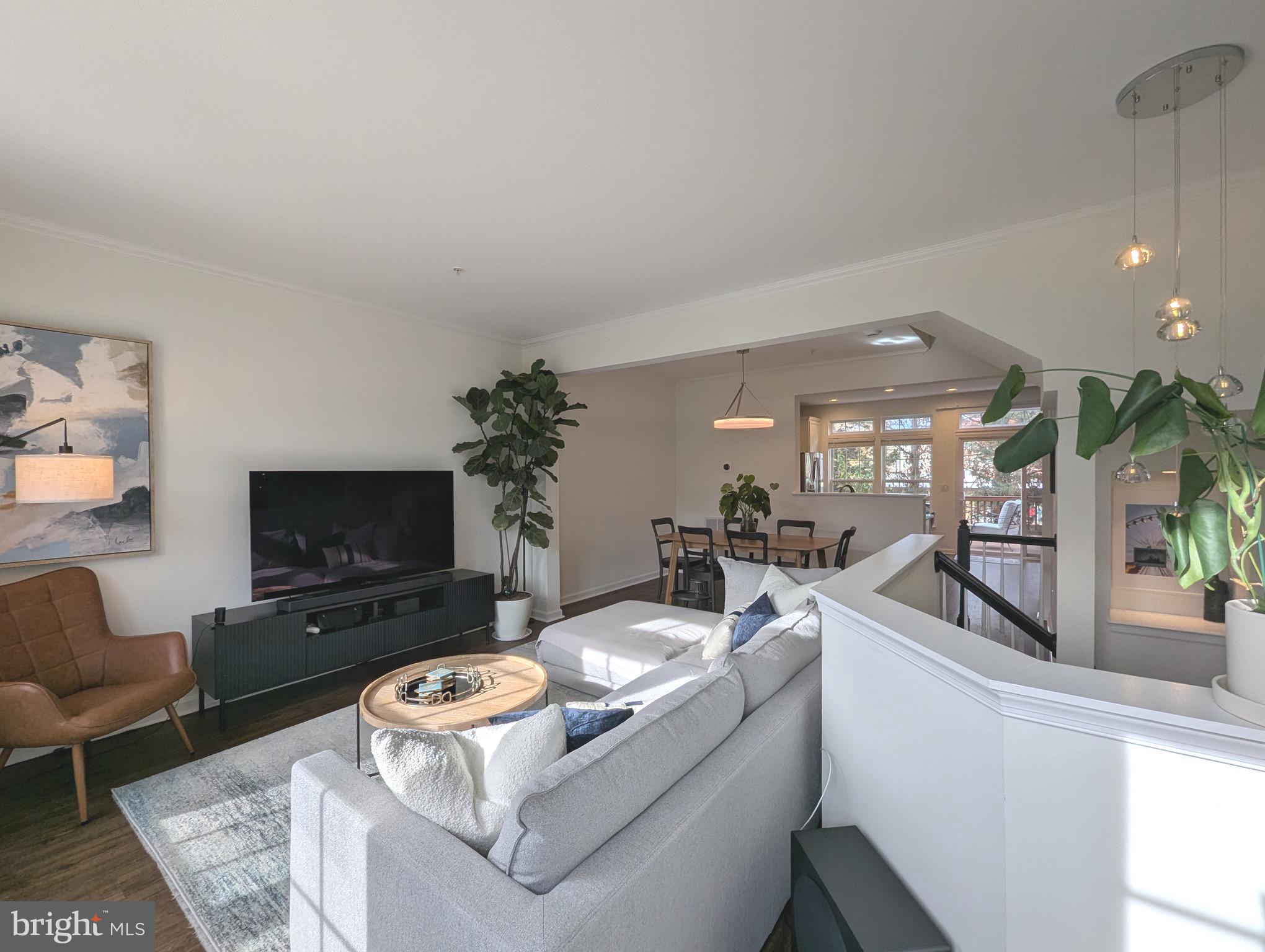2922 Huntington Grove Square Alexandria, VA 22306 - Photo 2 of 30 a living room with furniture and a flat screen tv