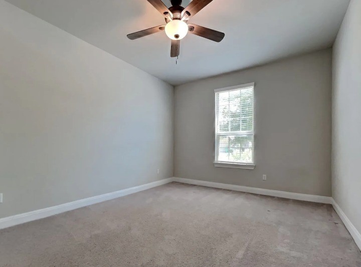 3610 Thunian Pass Pflugerville, TX 78660 - Photo 16 of 27 a view of room with window and ceiling fan