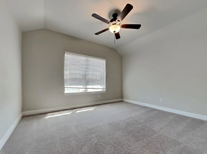 3610 Thunian Pass Pflugerville, TX 78660 - Photo 23 of 27 an empty room with a window and a fan