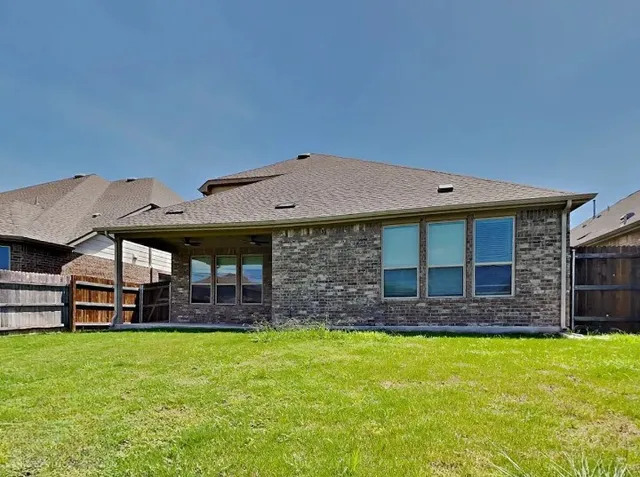 a bathroom with a toilet and a bathtub