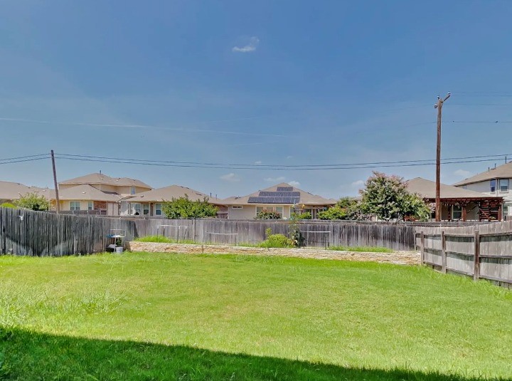 3610 Thunian Pass Pflugerville, TX 78660 - Photo 26 of 27 a view of a house with a big yard and potted plants
