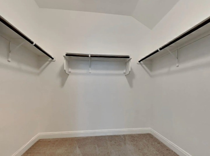 3610 Thunian Pass Pflugerville, TX 78660 - Photo 7 of 27 a view of an empty walk in closet