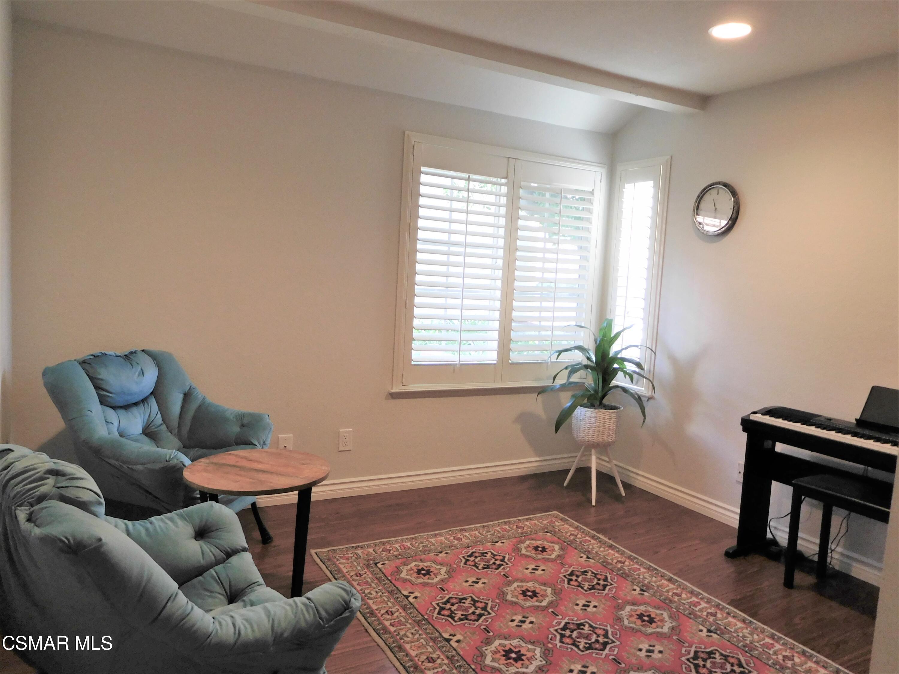 5225 Diane Street, Unit B Simi Valley, CA 93063 - Photo 12 of 24 a living room with furniture and a window