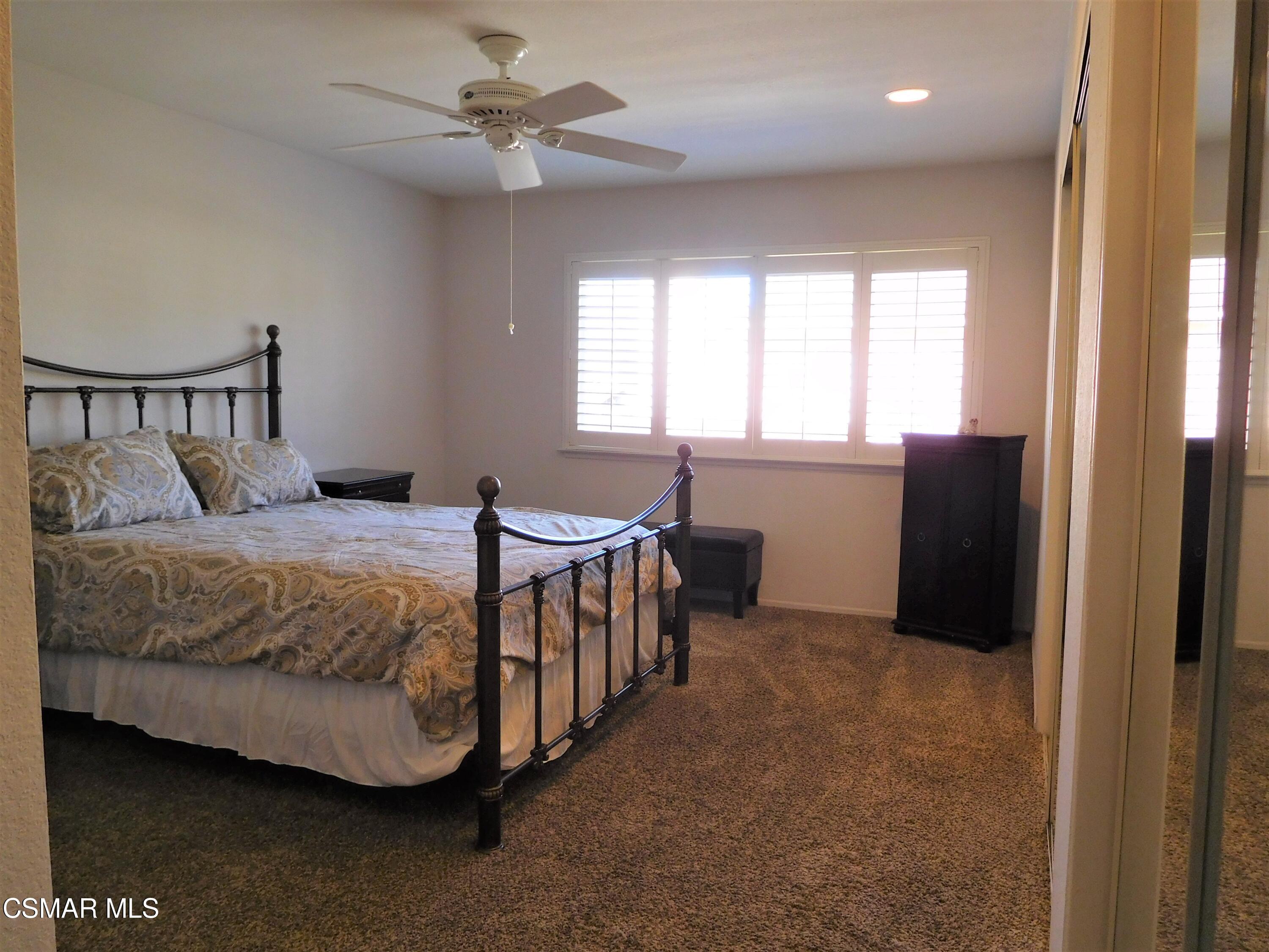 5225 Diane Street, Unit B Simi Valley, CA 93063 - Photo 14 of 24 a bed room with a bed and a window