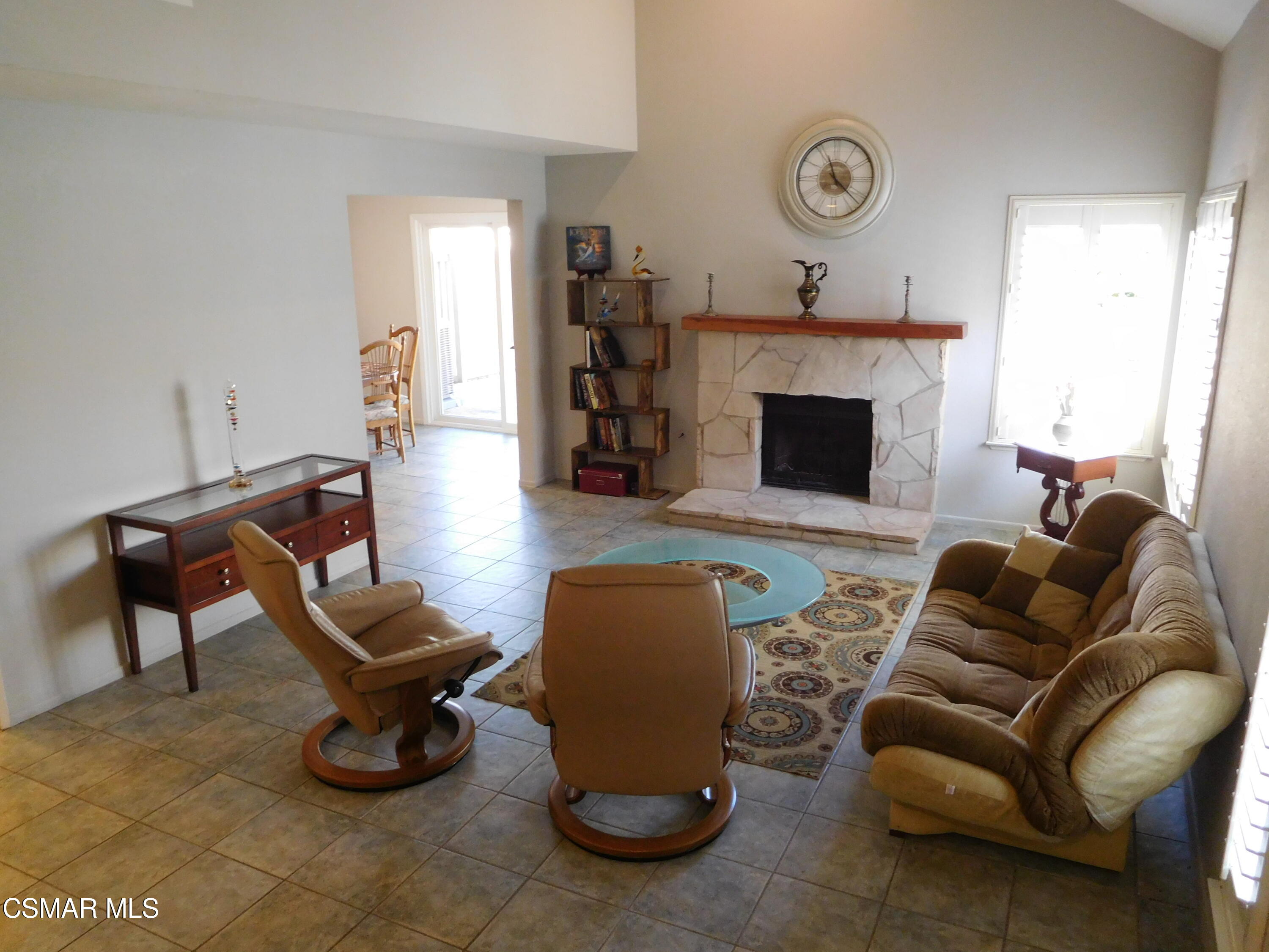 5225 Diane Street, Unit B Simi Valley, CA 93063 - Photo 6 of 24 a living room with furniture and a fireplace