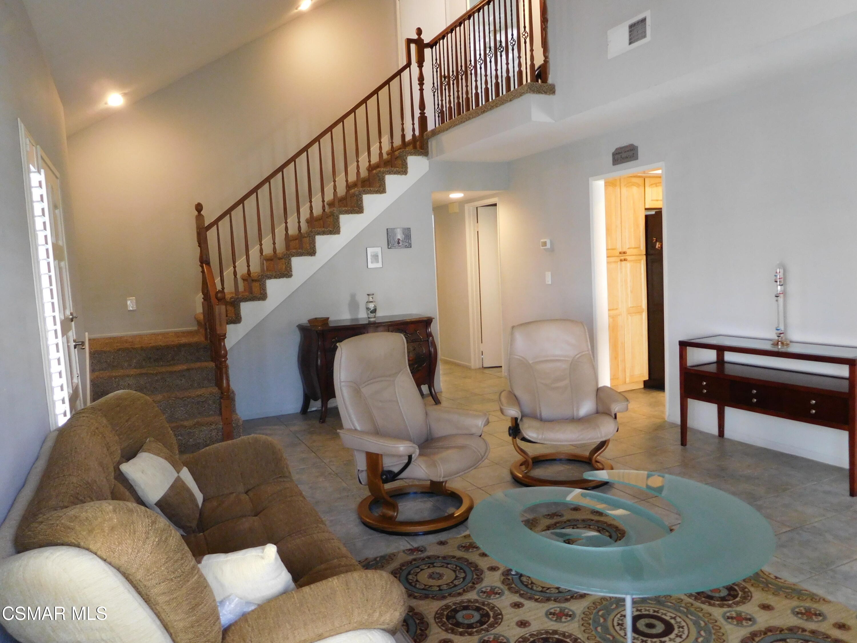 5225 Diane Street, Unit B Simi Valley, CA 93063 - Photo 7 of 24 a living room with furniture and wooden floor