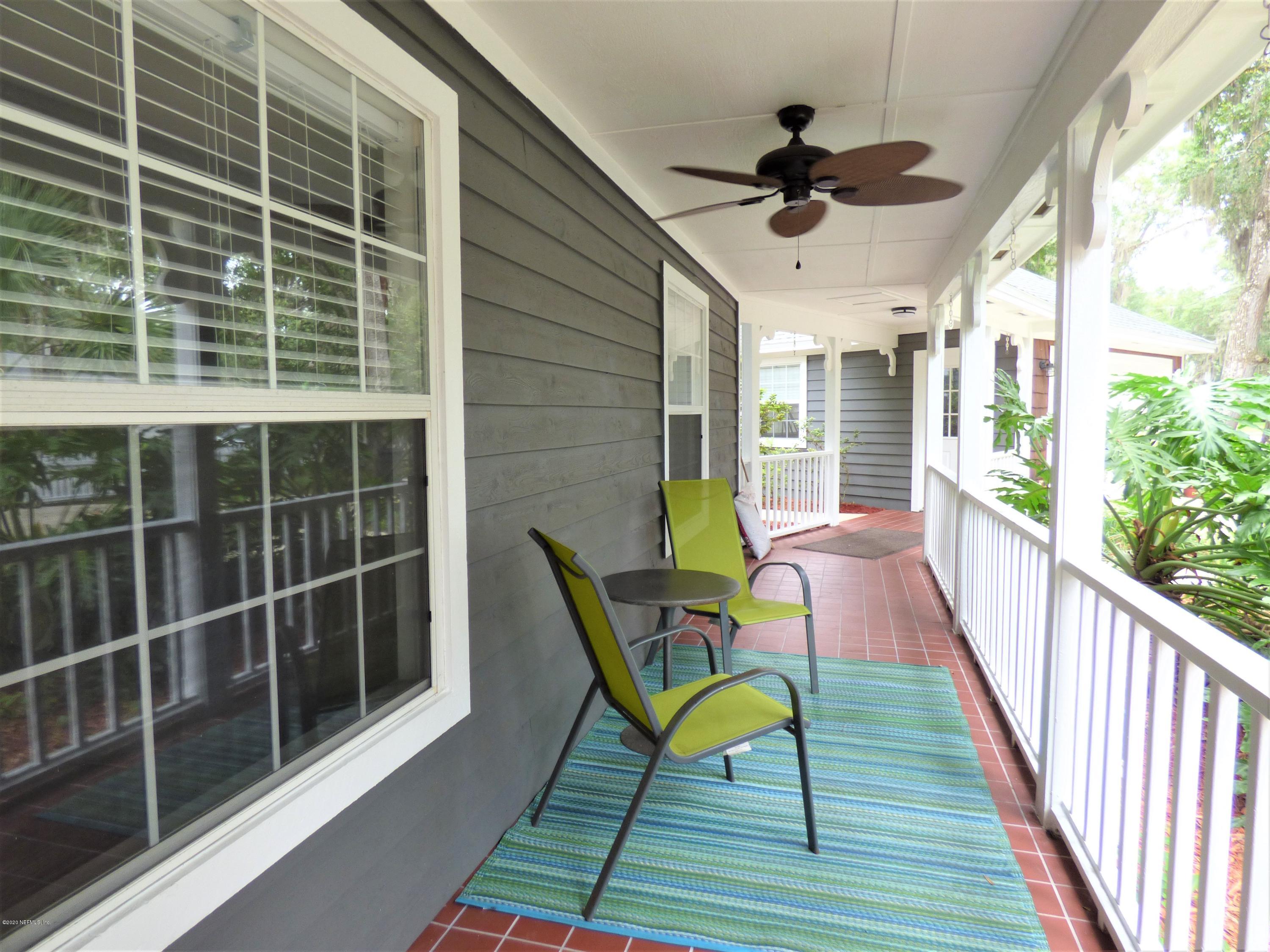 215 Mimosa Road St. Augustine, FL 32086 - Photo 8 of 31 a view of a porch with furniture and a window