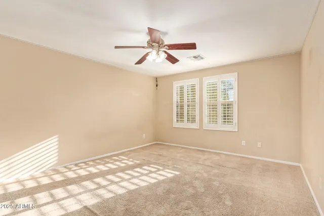 a bathroom with a shower and a shower curtain