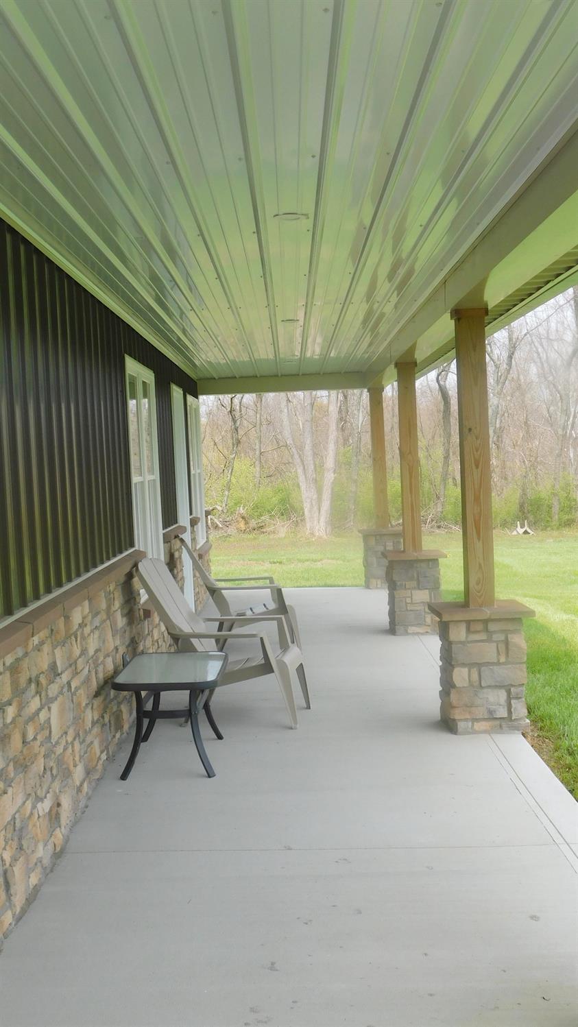 2750 Split Oak Trail Rising Sun, IN 47040 - Photo 35 of 40 Side covered porch w/entry door to sitting area