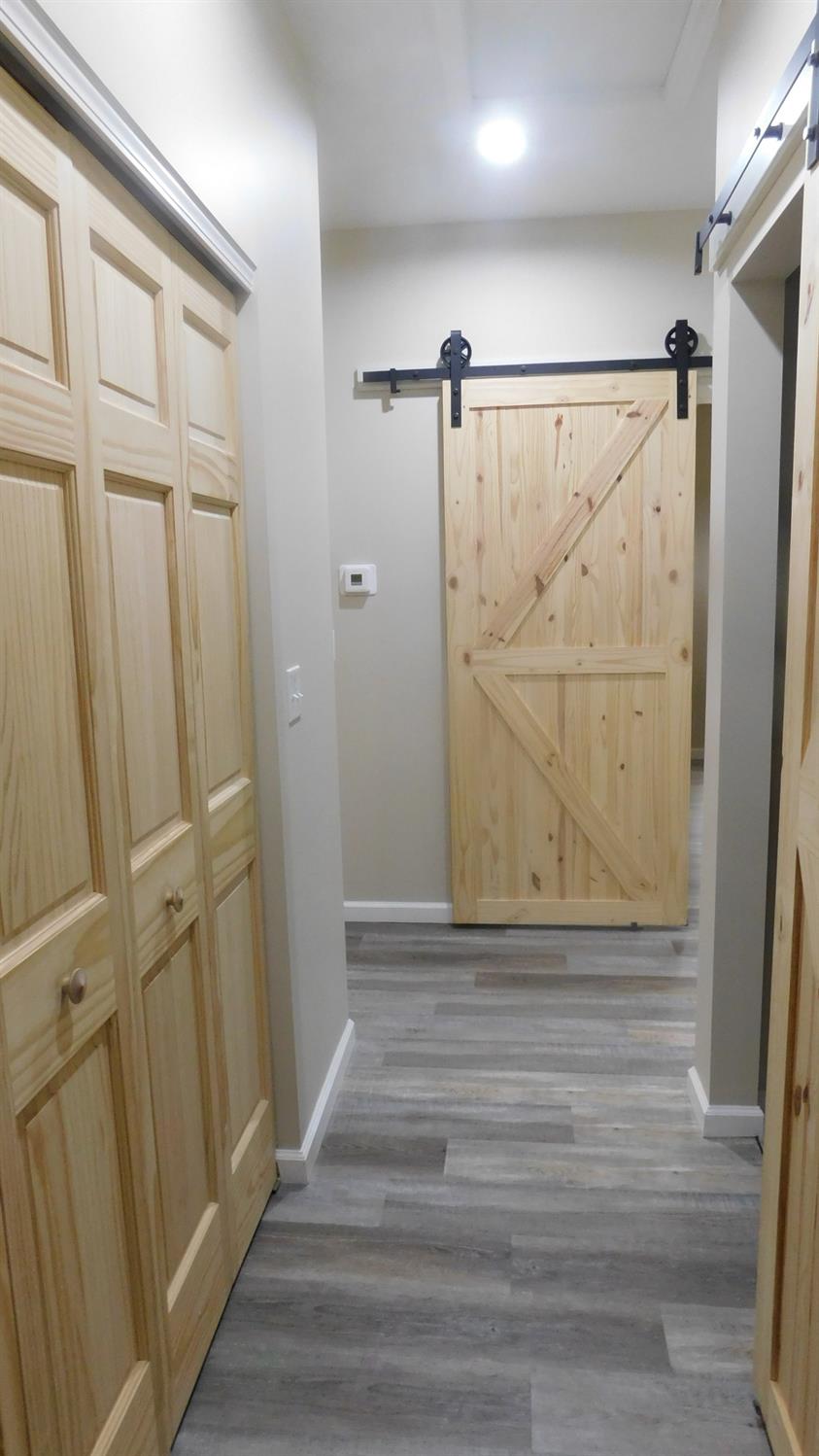 2750 Split Oak Trail Rising Sun, IN 47040 - Photo 10 of 40 Hallway off Master Bedroom with laundry closet on left