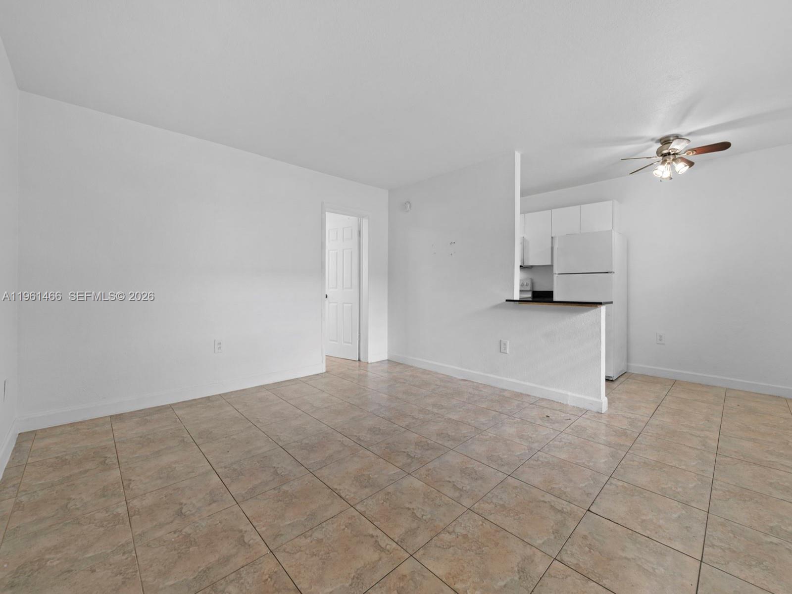 4444 Southwest 67th Avenue, Unit 7 Miami, FL 33155 - Photo 1 of 28 a view of empty room with ceiling fan