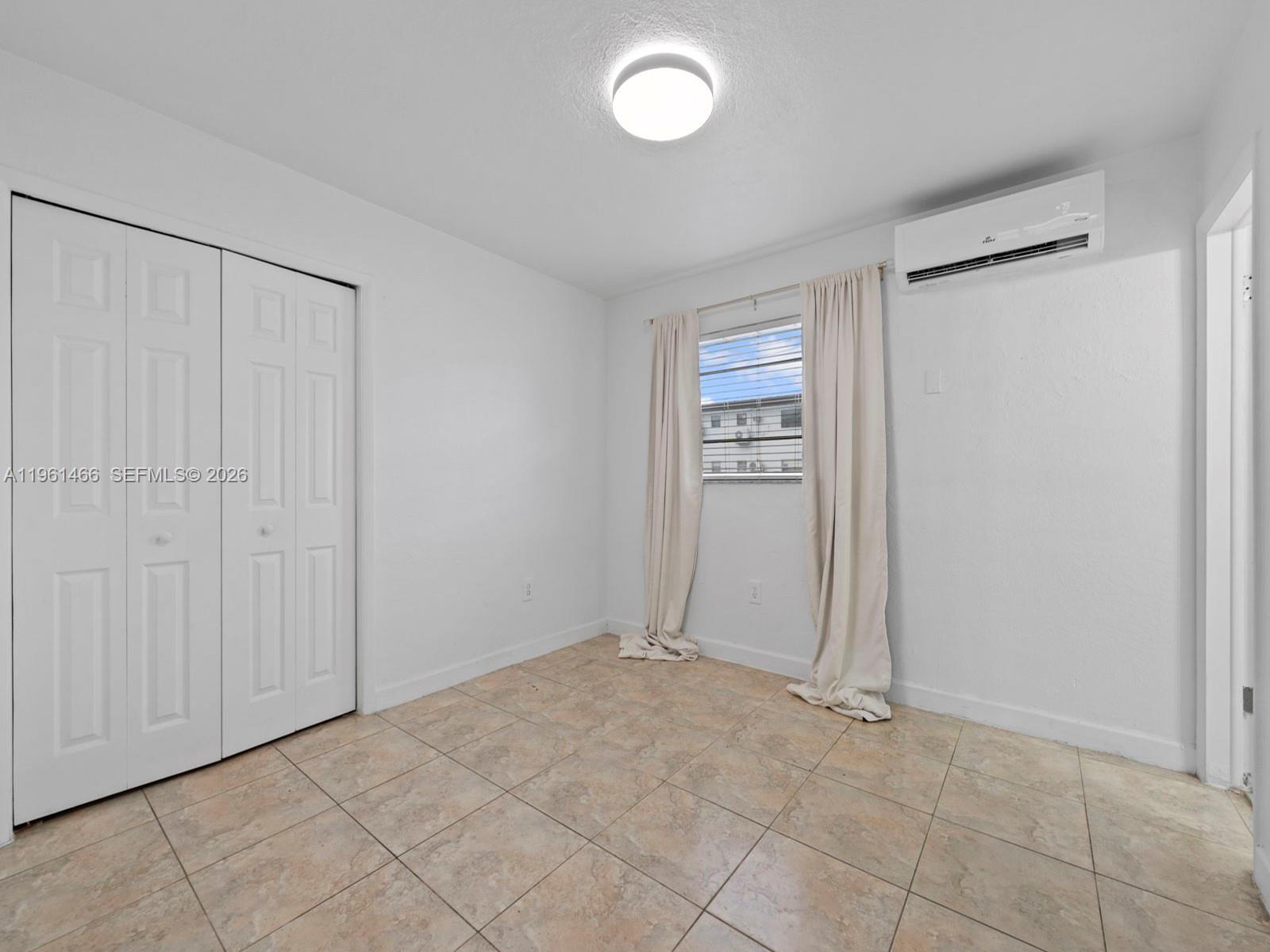 4444 Southwest 67th Avenue, Unit 7 Miami, FL 33155 - Photo 11 of 28 a view of an empty room