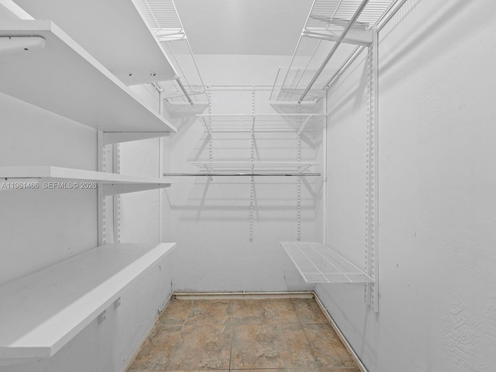 4444 Southwest 67th Avenue, Unit 7 Miami, FL 33155 - Photo 13 of 28 a view of walk in closet