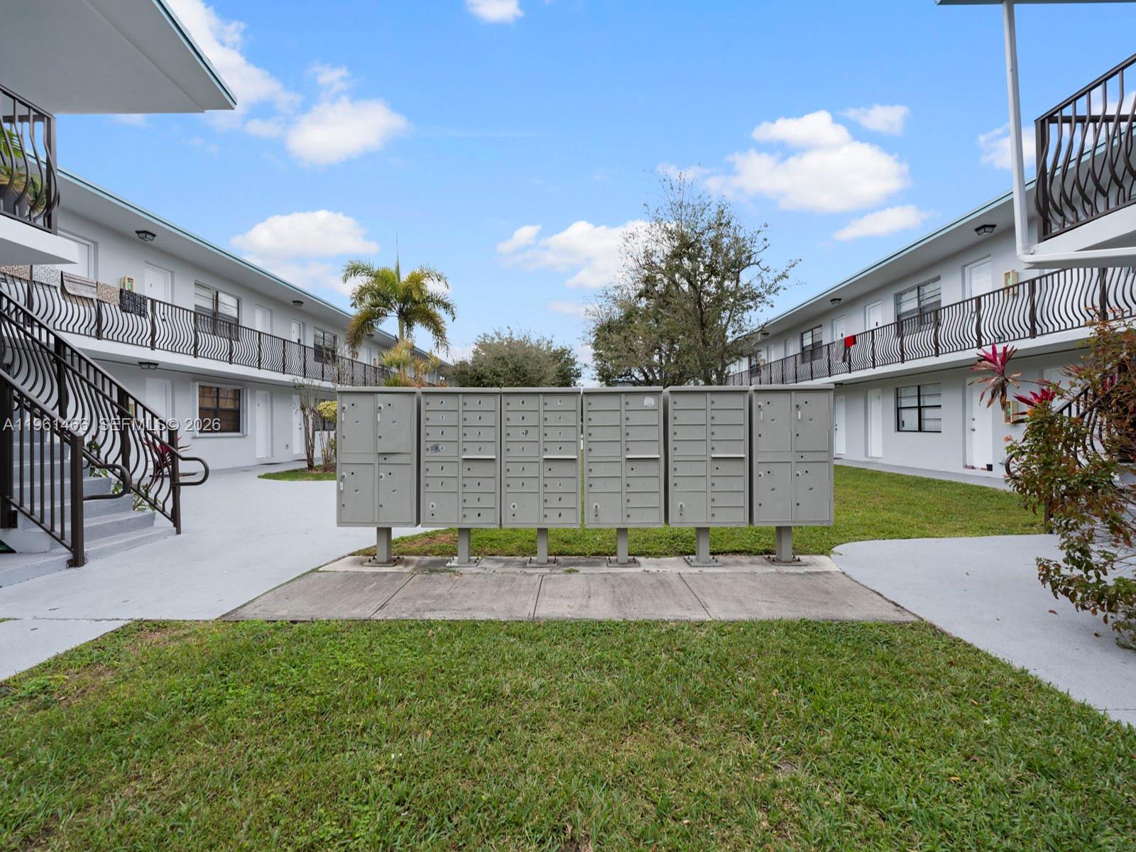 4444 Southwest 67th Avenue, Unit 7 Miami, FL 33155 - Photo 16 of 28 a view of yard with swimming pool and seating area
