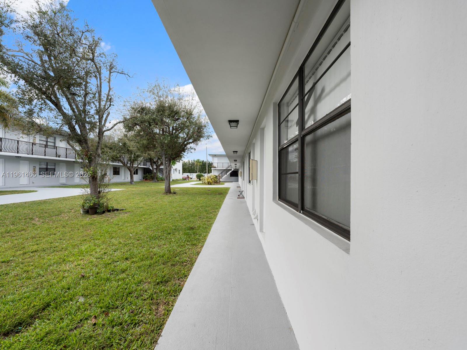 4444 Southwest 67th Avenue, Unit 7 Miami, FL 33155 - Photo 19 of 28 a view of house with garden