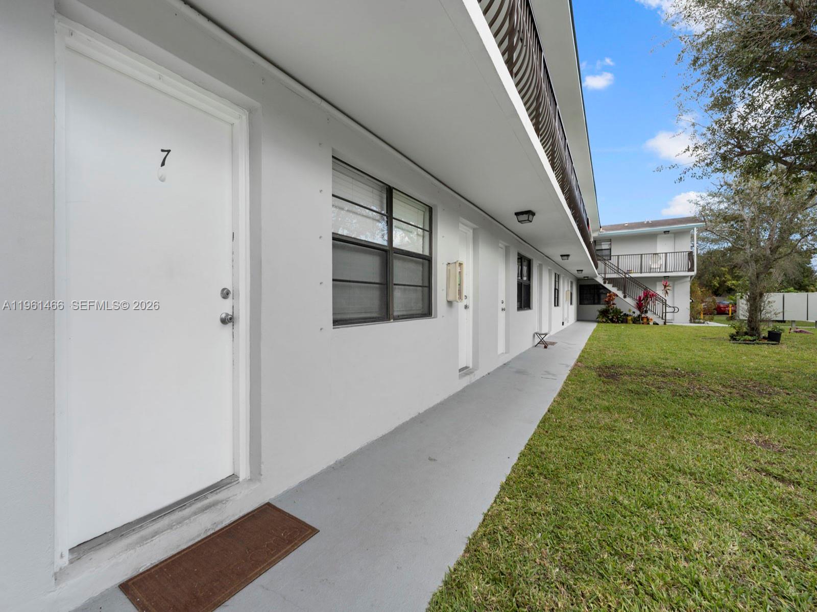 4444 Southwest 67th Avenue, Unit 7 Miami, FL 33155 - Photo 20 of 28 a view of a back yard of the house