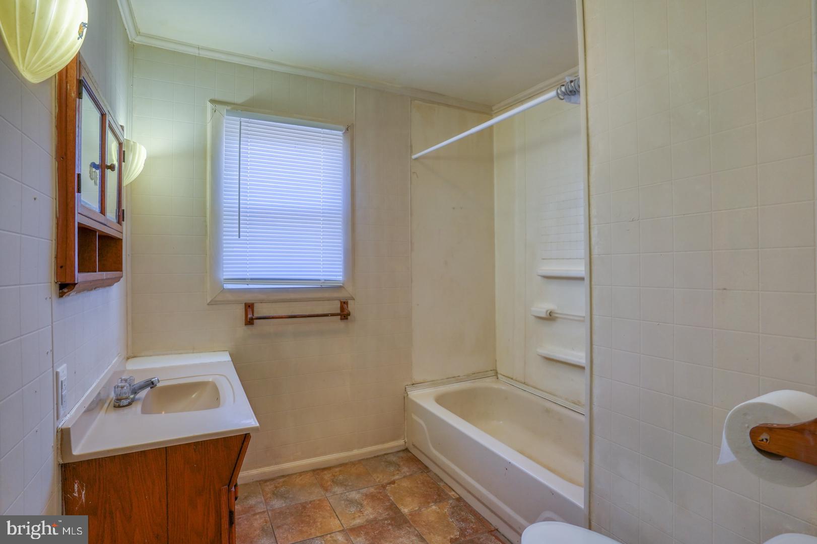 27768 Possum Point Road Millsboro, DE 19966 - Photo 21 of 25 Bathroom with tub/shower