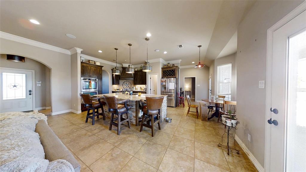 1431 Cheyenne Trail Nemo, TX 76070 - Photo 15 of 37 a view of a dining area with furniture
