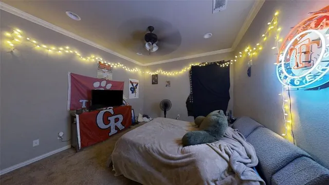 a bed room with a bed and a mirror