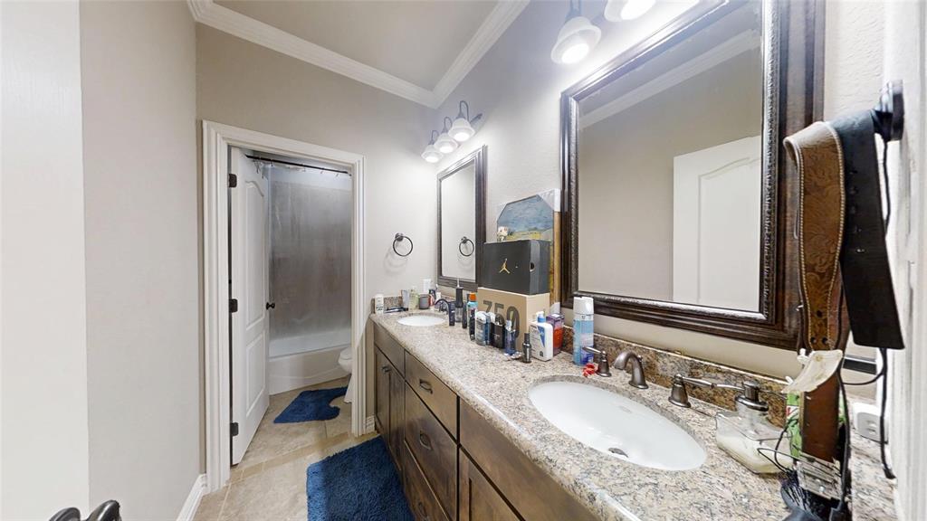1431 Cheyenne Trail Nemo, TX 76070 - Photo 20 of 37 a en suite bathroom with a granite countertop sink and a mirror