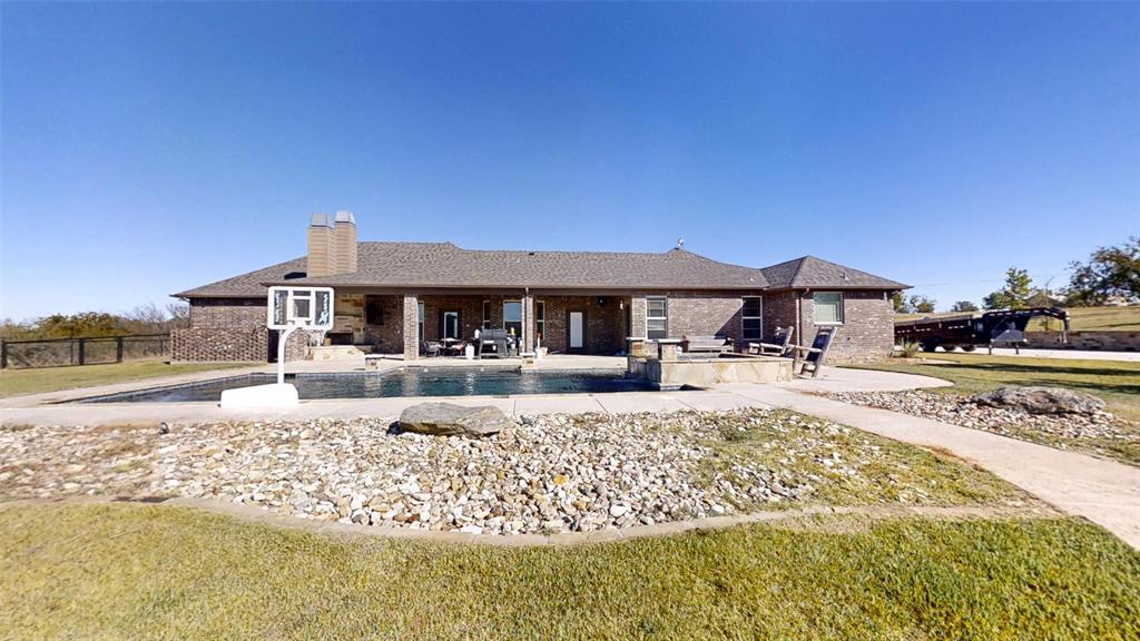 1431 Cheyenne Trail Nemo, TX 76070 - Photo 23 of 37 a view of a house with a patio