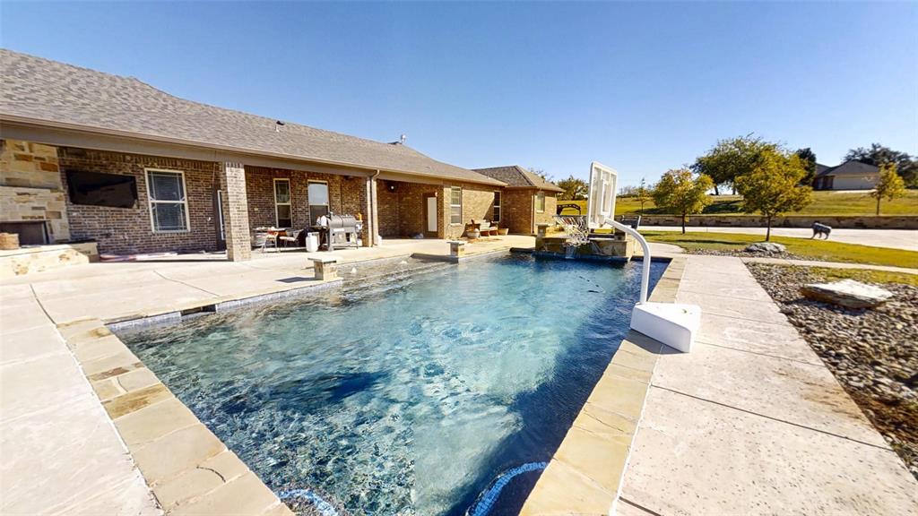 1431 Cheyenne Trail Nemo, TX 76070 - Photo 27 of 37 a view of a patio with swimming pool table and chairs