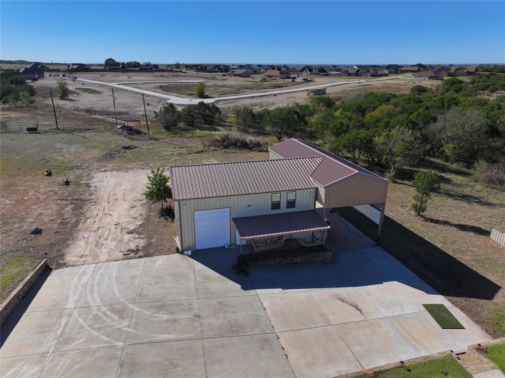 1431 Cheyenne Trail Nemo, TX 76070 - Photo 29 of 37 a view of a terrace with a yard