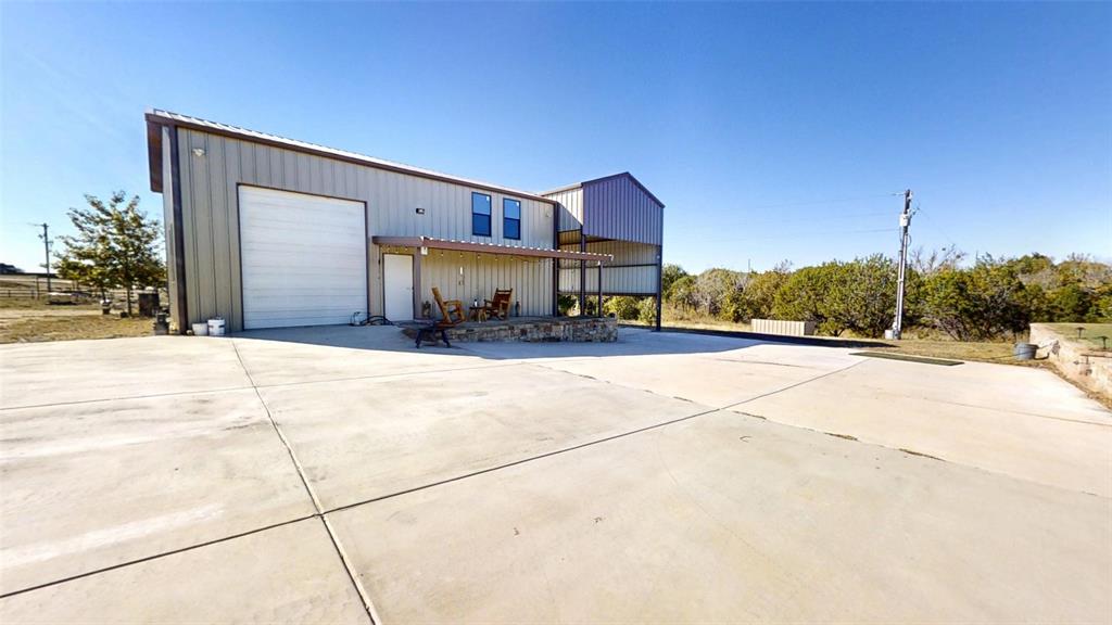 1431 Cheyenne Trail Nemo, TX 76070 - Photo 30 of 37 a view of a house with a patio
