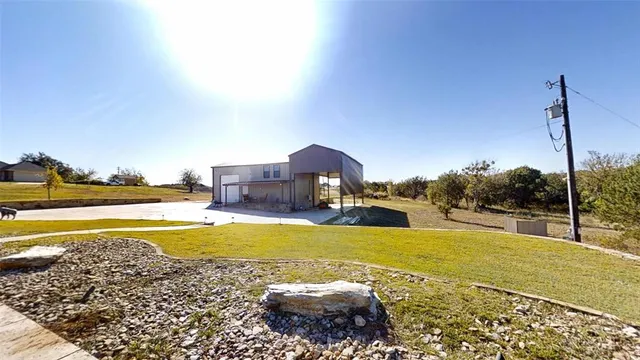 a view of a swimming pool with an ocean view
