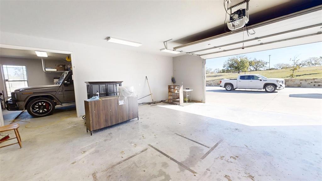1431 Cheyenne Trail Nemo, TX 76070 - Photo 32 of 37 a view of a livingroom with furniture and a flat screen tv