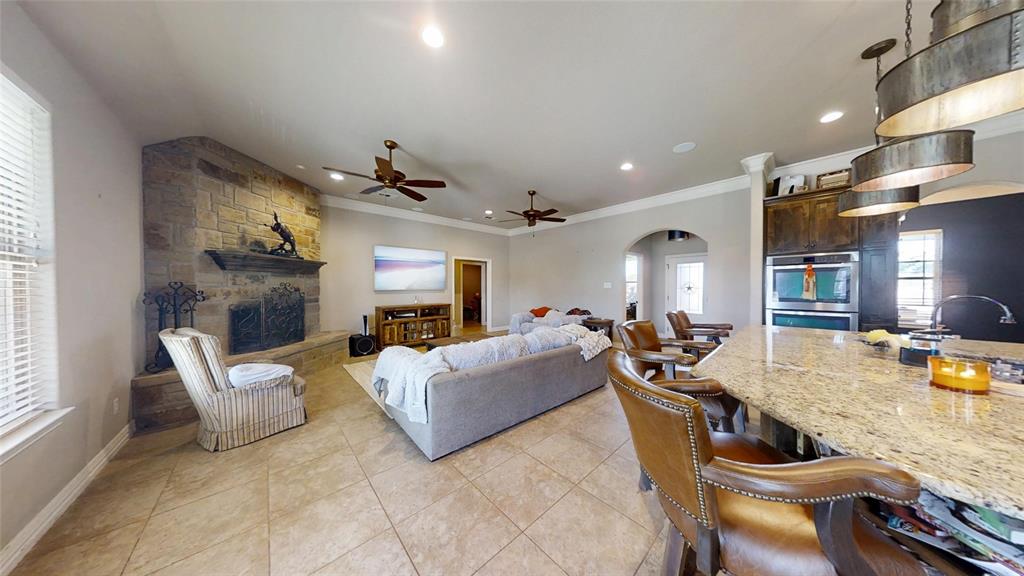 1431 Cheyenne Trail Nemo, TX 76070 - Photo 8 of 37 a living room with furniture and a wooden floor