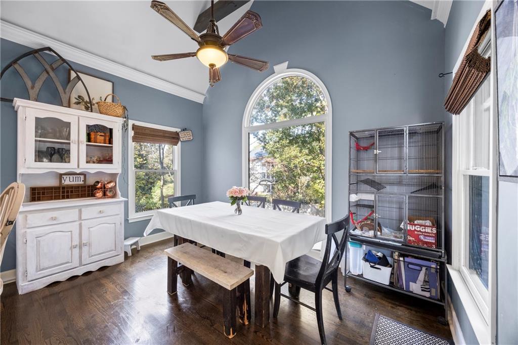 3420 Millwater Crossing Northeast Dacula, GA 30019 - Photo 17 of 54 a view of a dining room with furniture window and wooden floor
