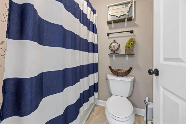 a room with a bed and a window