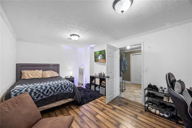 a room with furniture and wooden floor