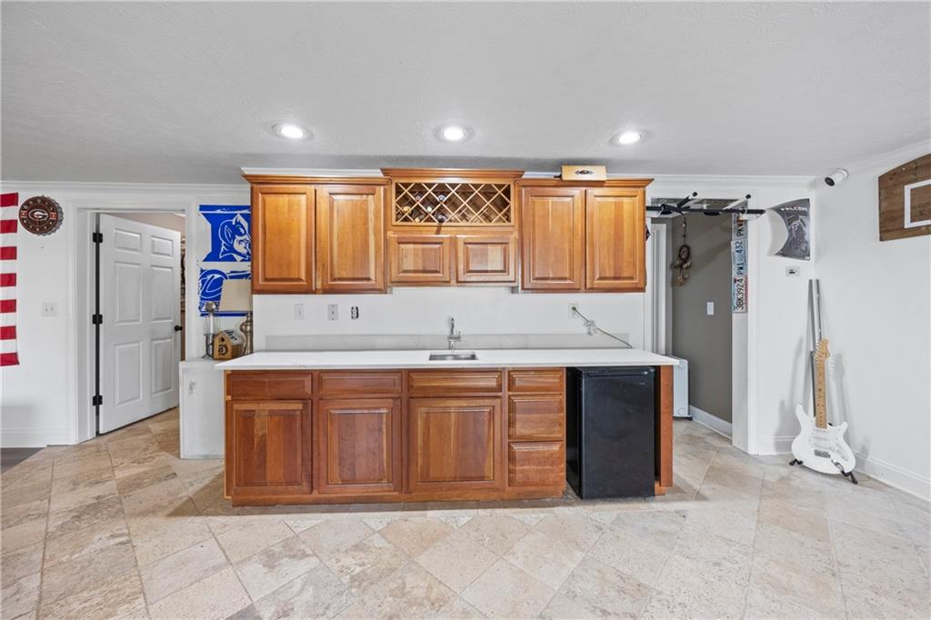 3420 Millwater Crossing Northeast Dacula, GA 30019 - Photo 36 of 54 a spacious bathroom with a tub sink and mirror