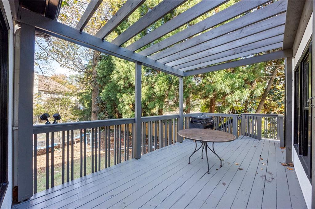 3420 Millwater Crossing Northeast Dacula, GA 30019 - Photo 38 of 54 a view of a two chairs in the deck