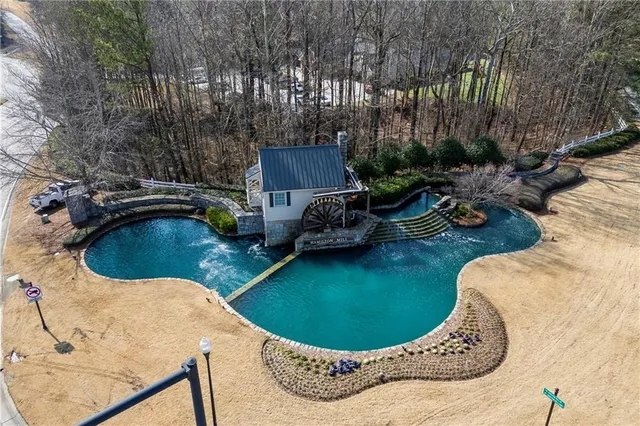 a front view of a building with glass windows and door