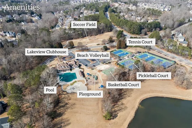 an aerial view of a house swimming pool patio and outdoor seating