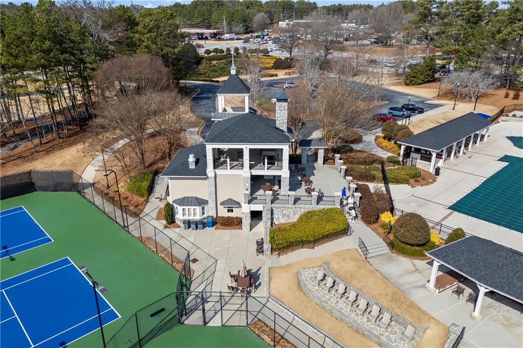 3420 Millwater Crossing Northeast Dacula, GA 30019 - Photo 51 of 54 an aerial view of a house with garden space and street view