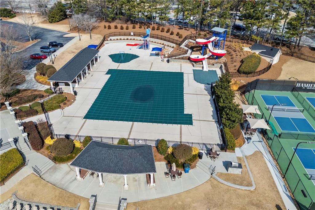 3420 Millwater Crossing Northeast Dacula, GA 30019 - Photo 52 of 54 an aerial view of a house swimming pool patio and outdoor seating